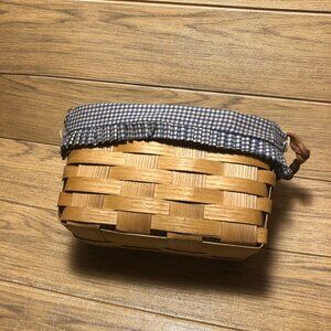 Vintage Peterboro medium size woven basket with original blue yellow gangham cot